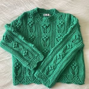 Chunky green sweater